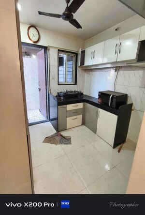 Kitchen in 2 BHK Apartment at Arihant Aangan, Wadgaon Sheri – for Rent