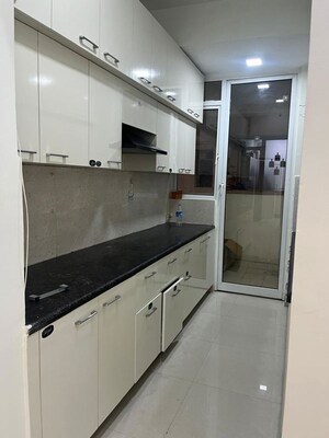 Kitchen in 2.5 BHK Apartment at Mahagun Mirabella, Sector 79 – for Rent