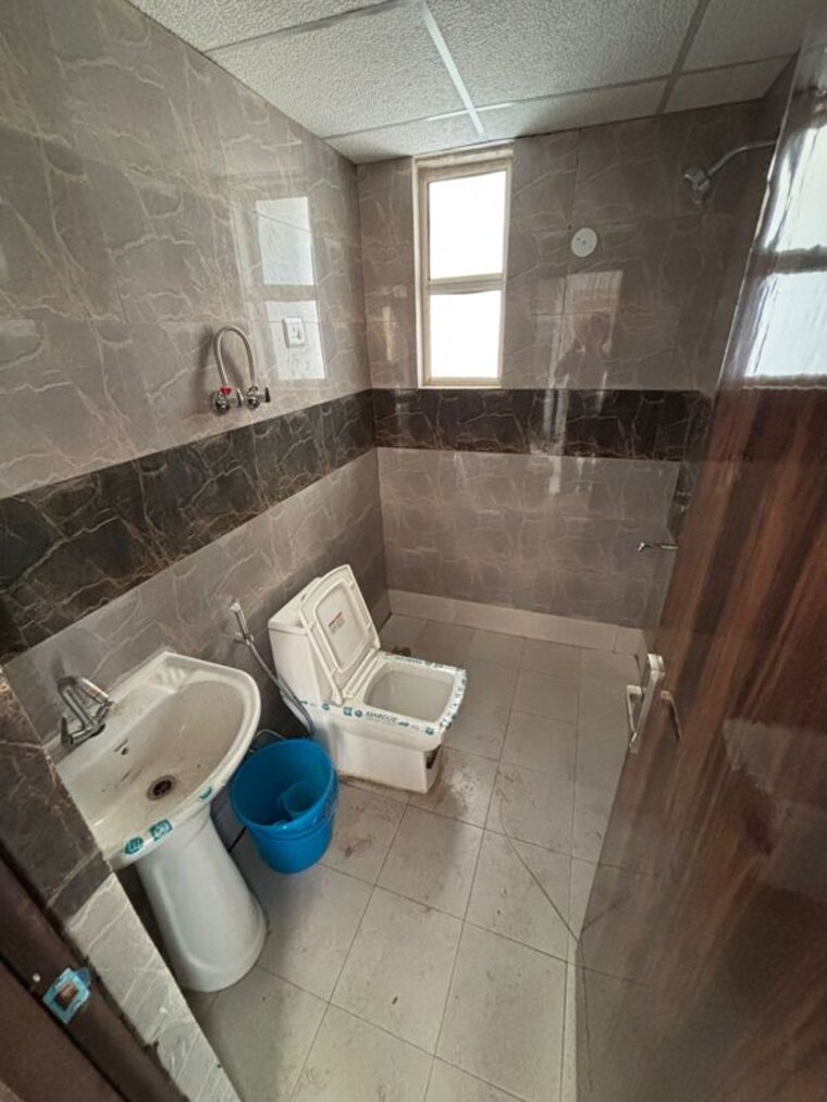 Bathroom, supertech-eco-village-ii 2.5 Bedroom 1267 Sq.Ft. Apartment In Sector 16b Greater Noida Greater Noida 10331538