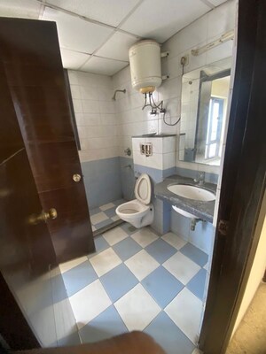Bathroom in 2 BHK Apartment at Eros Kenwood Tower, Sector 39 – for Rent