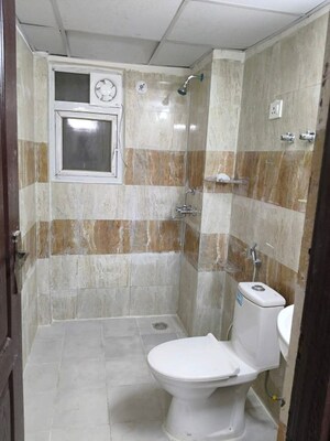 Bathroom in 2 BHK Apartment at AIMS Golf Town, Sector 4 Greater Noida – for Rent