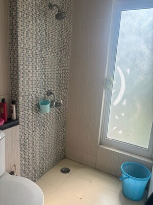 Bathroom in 3 BHK Apartment at Mahagun Moderne, Sector 78 – for Rent