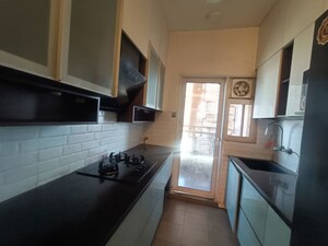 Kitchen in 3.5 BHK Apartment at Mahagun Moderne, Sector 78 – for Rent