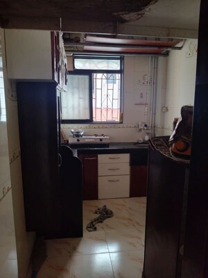 Kitchen in 1 BHK Apartment at Guru Sankalp CHS, New Panvel – for Rent