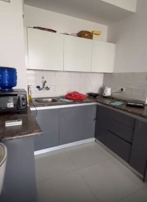 Kitchen in 1 BHK Apartment at Sunworld Arista, Sector 168 – for Rent