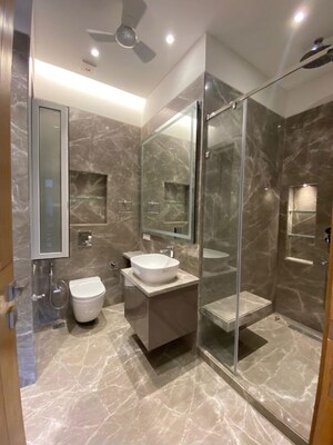 Bathroom in 3 BHK Builder Floor at Green Park Extension – for Rent