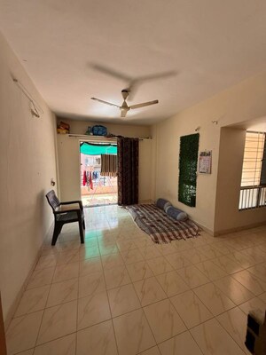 Living Room in 1.5 BHK Apartment at Wadhwani Mayureshwar Sai Nisarg Park CHS, Pimple Saudagar – for Rent