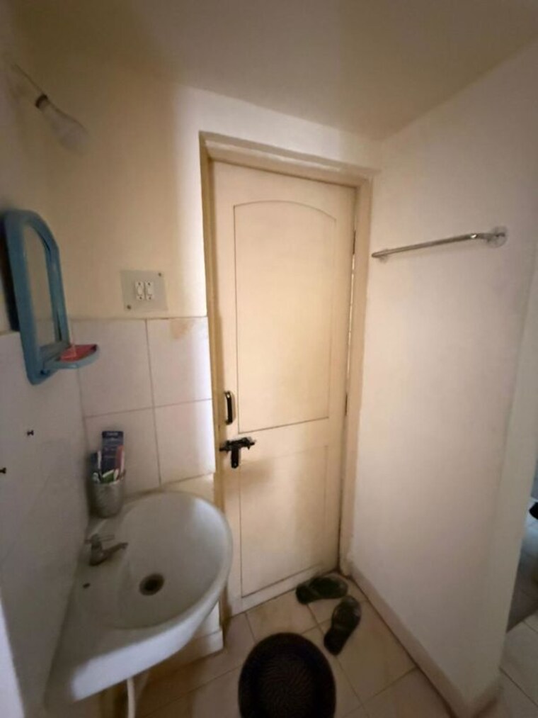Bathroom, wadhwani-mayureshwar-sai-nisarg-park-chs 1.5 Bedroom 600 Sq.Ft. Apartment In Pimple Saudagar Pune 10331837