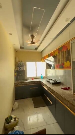 Kitchen in 4 BHK Apartment at Ashoka NCR Green Extension, Sector 1 Greater Noida – for Rent