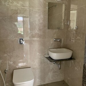 Bathroom in 2 BHK Apartment at Vasudev Terrace, Kastur Park – for Sale