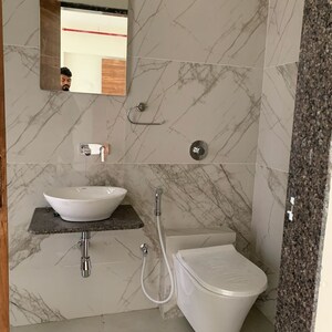 Bathroom in 2 BHK Apartment at Vasudev Terrace, Kastur Park – for Sale