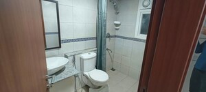 Bathroom in 2 BHK Apartment at Bhartiya Nikoo Homes Phase 2, Thanisandra Main Road – for Rent