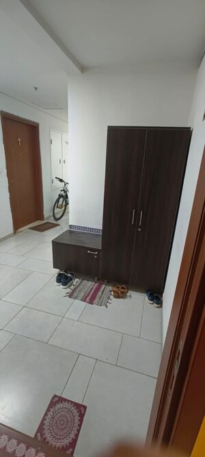 Living Room in 2 BHK Apartment at Bhartiya Nikoo Homes Phase 2, Thanisandra Main Road – for Rent