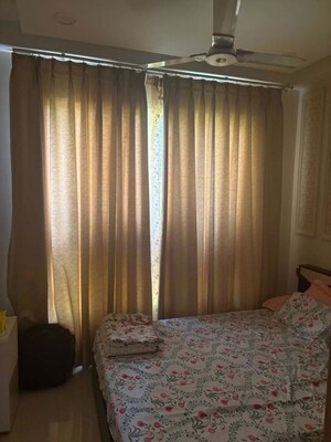 Living Room in 2.5 BHK Apartment at Bhartiya City Nikoo Homes II, Thanisandra Main Road – for Rent