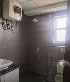 Bathroom in 2 BHK Apartment at Maya Green Lotus Saksham, International Airport Road – for Rent