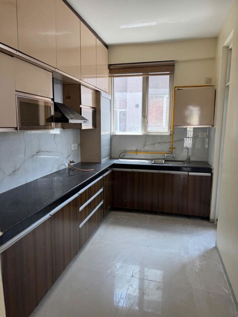 Kitchen, trishla-city 3 Bedroom 1600 Sq.Ft. Apartment In Patiala Road Zirakpur 10331985