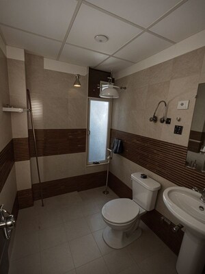 Bathroom in 3 BHK Apartment at Keltech Golf Greens, Dundahera – for Sale