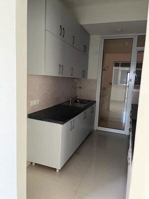 Kitchen in 2.5 BHK Apartment at Mahagun Mirabella, Sector 79 – for Rent