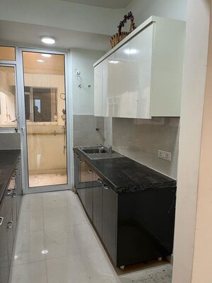 Kitchen in 2.5 BHK Apartment at Mahagun Mirabella, Sector 79 – for Rent