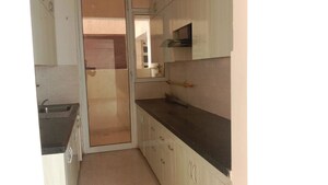 Kitchen in 3 BHK Apartment at Mahagun Mirabella, Sector 79 – for Rent