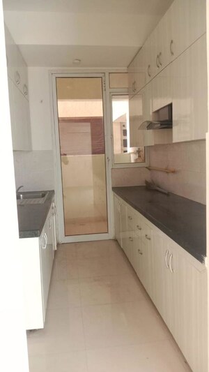 Kitchen in 3 BHK Apartment at Mahagun Mirabella, Sector 79 – for Rent