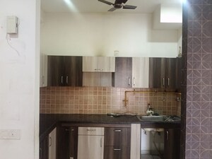 Kitchen in 2 BHK Apartment at Mahagun Mywoods, Sector 16c Greater Noida – for Rent