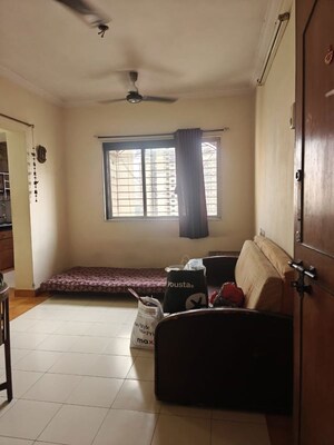 Living Room in 1 BHK Apartment at Puraniks Kanchanpushp Complex, Kavesar – for Rent