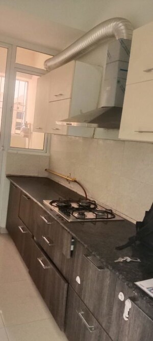 Kitchen in 3 BHK Apartment at Mahagun Mirabella, Sector 79 – for Rent