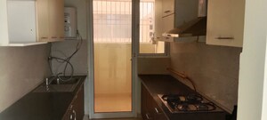 Kitchen in 3 BHK Apartment at Mahagun Mirabella, Sector 79 – for Rent