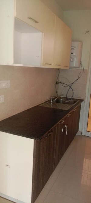 Kitchen in 3 BHK Apartment at Mahagun Mirabella, Sector 79 – for Rent
