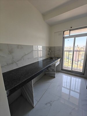 Kitchen in 1 BHK Apartment at Metropolis Bayside, Kasarvadavali – for Rent