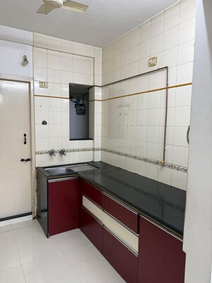 Kitchen in 1 BHK Apartment at Gokhale Saraswati Park, Ideal Colony – for Rent