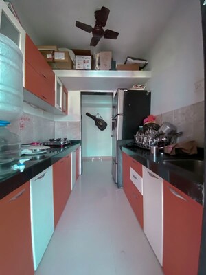 Kitchen in 3 BHK Apartment at Hubtown Greenwoods, Vartak Nagar – for Sale