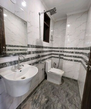 Bathroom in 2 BHK Apartment at Chattarpur – for Rent
