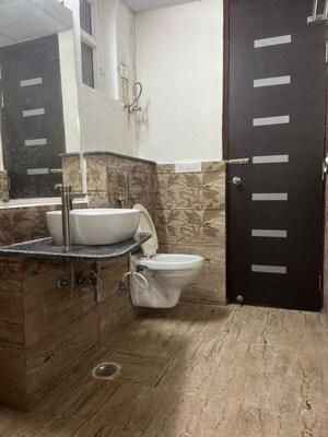 Bathroom in 3 BHK Apartment at Gaur Sportswood, Sector 79 – for Rent