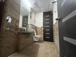 Bathroom in 3 BHK Apartment at Gaur Sportswood, Sector 79 – for Rent