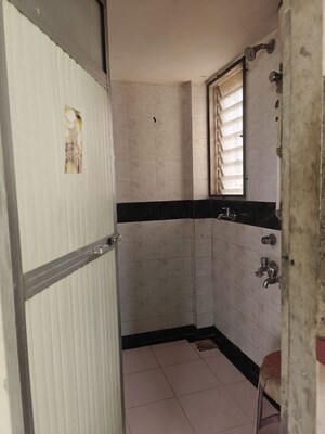 Bathroom in 1 BHK Apartment at Kanchan Pushp Society, Ghodbunder Road – for Rent