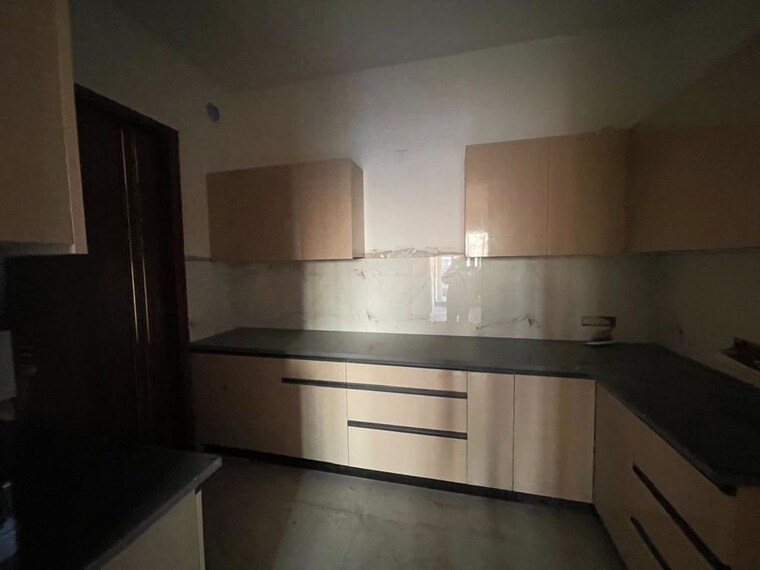 Kitchen, malwa-escon-primera 2 Bedroom 1305 Sq.Ft. Apartment In International Airport Road Zirakpur 10332324