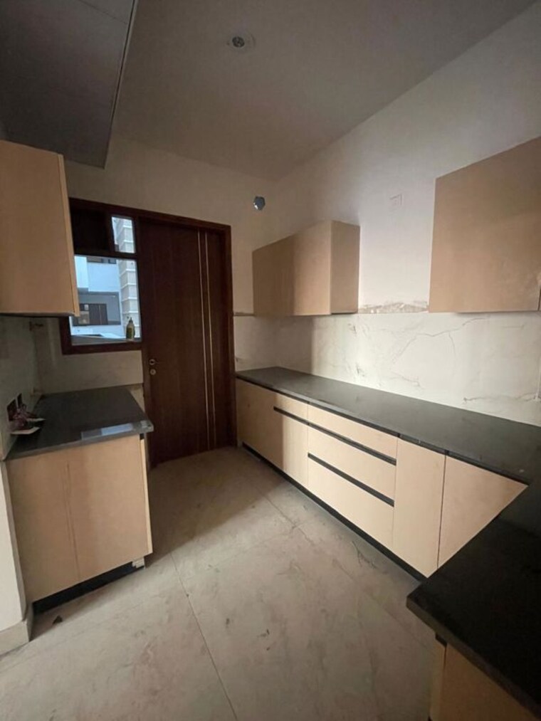 Kitchen, malwa-escon-primera 2 Bedroom 1305 Sq.Ft. Apartment In International Airport Road Zirakpur 10332324