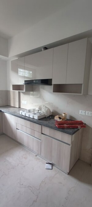 Kitchen in 2 BHK Apartment at Smart World Orchard, Sector 61 – for Sale