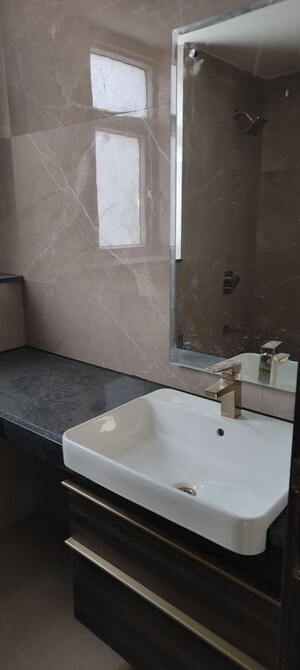 Bathroom in 2 BHK Apartment at Smart World Orchard, Sector 61 – for Sale