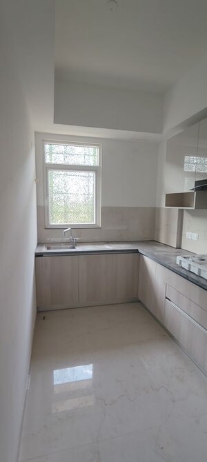 Kitchen in 2 BHK Apartment at Smart World Orchard, Sector 61 – for Sale