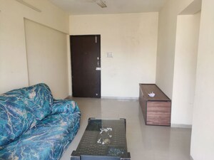 Living Room in 1 BHK Apartment at Kavya Residency Thane, Ghodbunder Road – for Rent