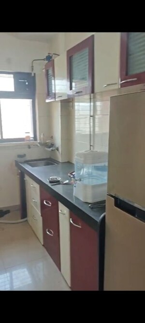Kitchen in 1 BHK Apartment at Pushpanjali Heights, Owale – for Rent