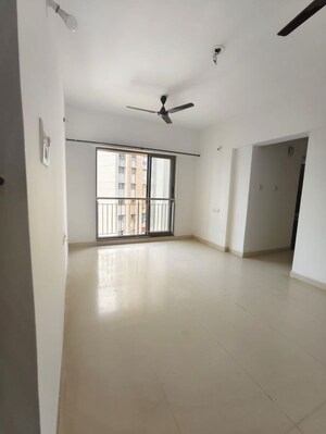 Living Room in 1 BHK Apartment at Lodha Splendora, Ghodbunder Road – for Rent
