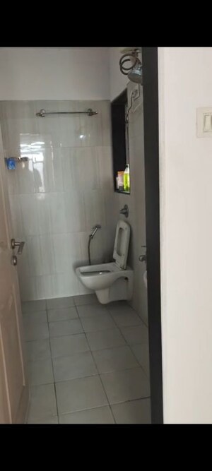 Bathroom in 2 BHK Apartment at Puranik City, Kasarvadavali – for Rent