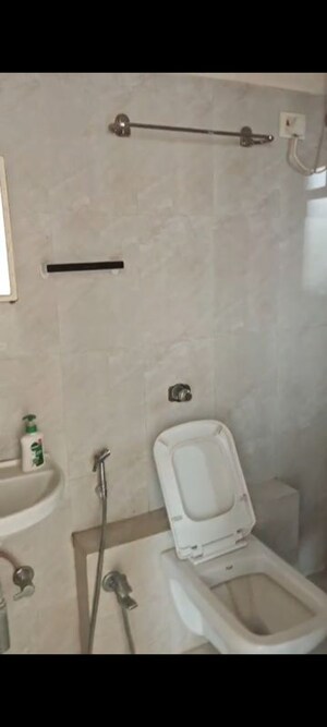 Bathroom in 2 BHK Apartment at Puranik City, Kasarvadavali – for Rent