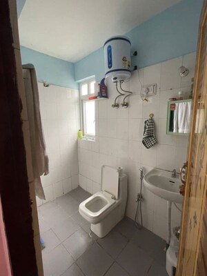 Bathroom in 2 BHK Apartment at Shrachi Greenwood Elements, Rajarhat New Town – for Rent