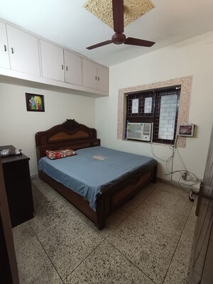 Bedroom in 2 BHK Builder Floor at Nehru Enclave – for Rent