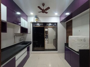 Kitchen in 1 BHK Apartment at Baba Solitaire, Vashi Sector 26 – for Rent
